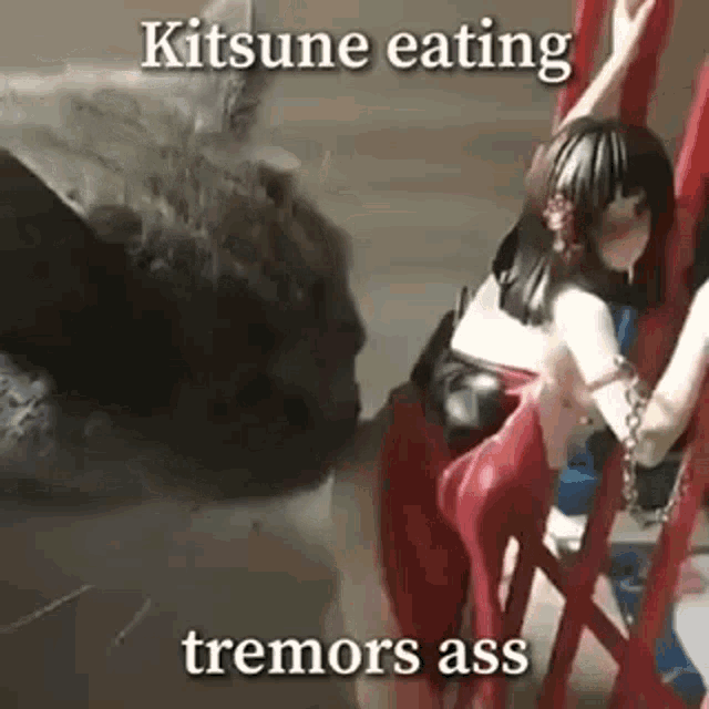 a cat is eating a statue of a girl while a statue of a girl is sitting on a ladder .