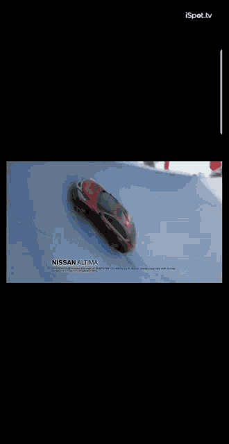 a red nissan car is shown on a black screen