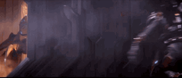 a blurred image of a person 's face with a light coming out of it