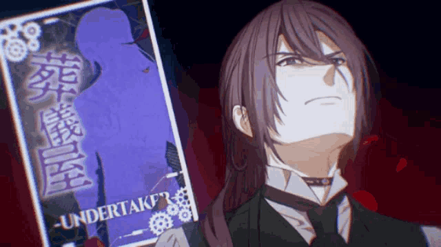a man in a suit and tie stands in front of a poster that says undertaker