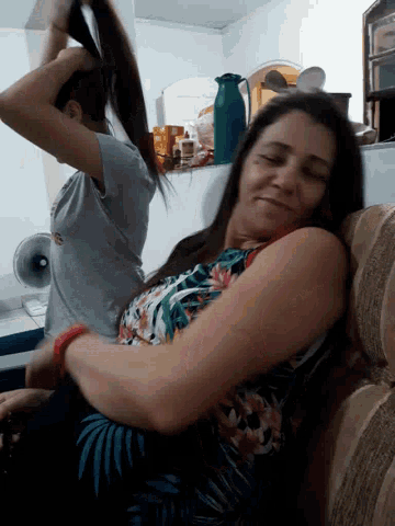 Posing Ponytail GIF - Posing Ponytail On The Couch GIFs