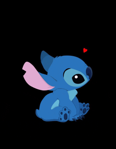 a blue stitch with a pink ear and a red heart on its head