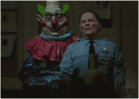 a police officer is standing next to a clown