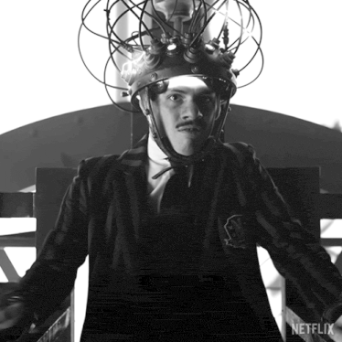 a black and white photo of a man with a netflix logo