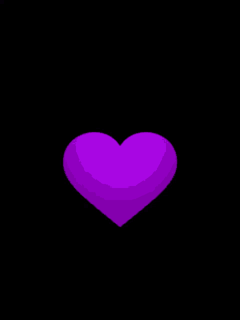 a purple heart is floating in the air on a black background