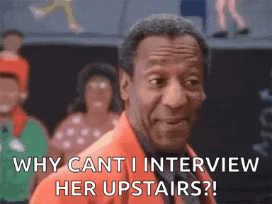 a man is standing in front of a crowd and saying `` why can 't i interview her upstairs ? ``