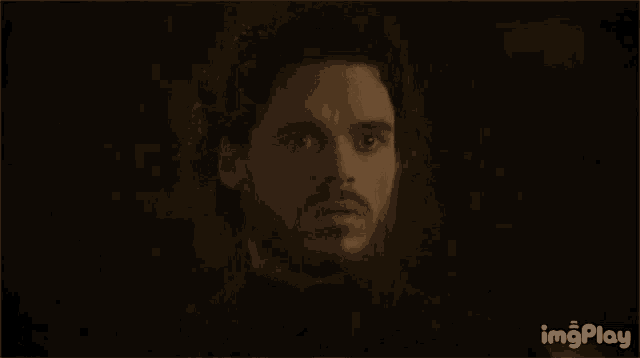a close up of a man 's face with the words imgplay visible