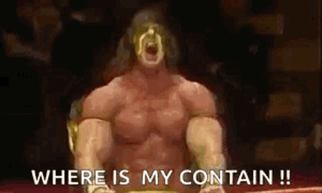 a wrestler is sitting in a boxing ring with his mouth open and screaming .
