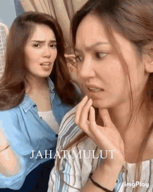 two women are standing next to each other with the words jahat mulut on the bottom right