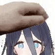 a hand is holding a girl 's head with a knife in it .