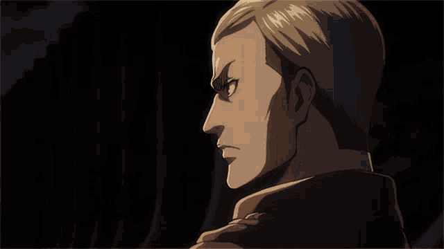 a close up of a man 's face with a shadow behind his ear