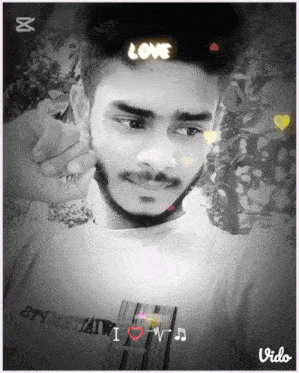 a black and white photo of a man with the word love written on his head