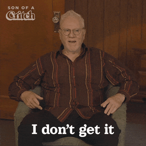 a man is sitting in a chair with the words i don 't get it on the bottom