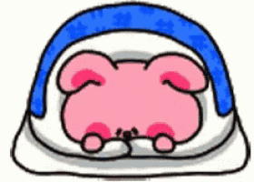 a cartoon drawing of a pink rabbit sleeping in a bed with a blue blanket .