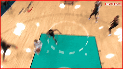 an aerial view of a basketball game with the words raptors nation on the bottom right