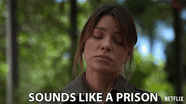 a woman with her eyes closed says sounds like a prison netflix