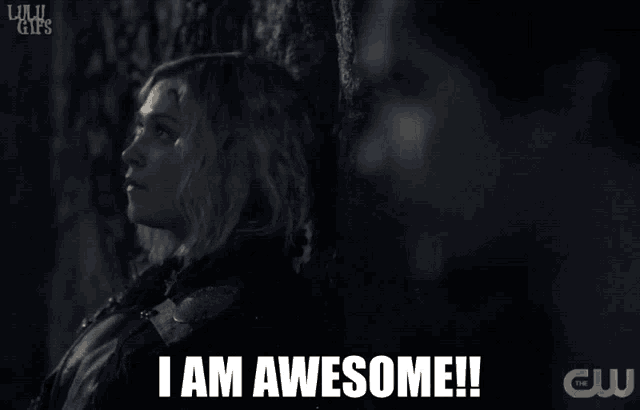 a woman leaning against a tree with a caption that says i am awesome