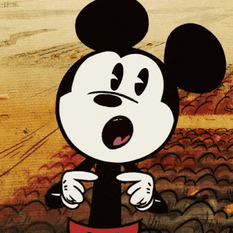 a cartoon drawing of mickey mouse making a surprised face