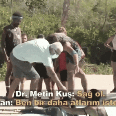 a group of people are gathered around a man who says dr. metin kus