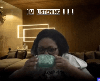 a woman drinking from a cup with the words i 'm listening written above her