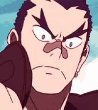 a close up of a man 's face with a serious look on his face