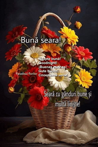 a bouquet of flowers in a basket with the words buna seara on the bottom