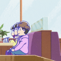 a couple of cartoon characters sitting in a booth