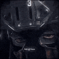 a close up of a person 's face with the number 2 on the top
