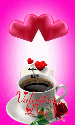 a cup of coffee on a saucer that says valentine 's day on it