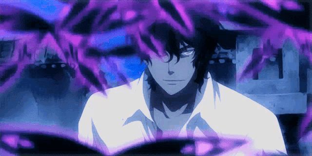 a man in a white shirt is surrounded by purple flames