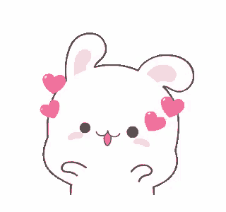 a white rabbit with pink hearts on its ears is looking at the camera .