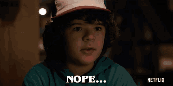a young boy wearing a hat says nope on the screen
