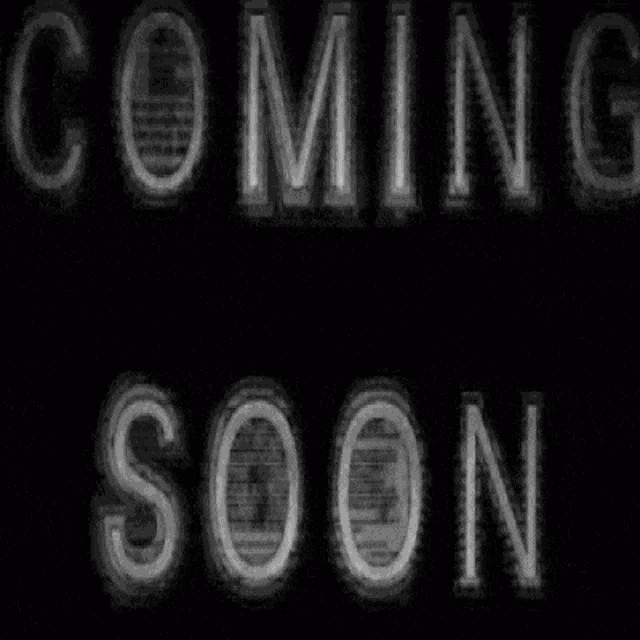 a black and white sign that says coming soon on it