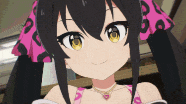 a close up of a girl with a heart shaped necklace