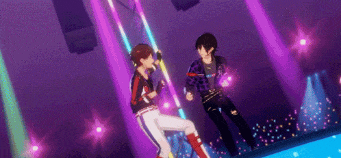 two anime characters are dancing on a stage in front of a microphone .