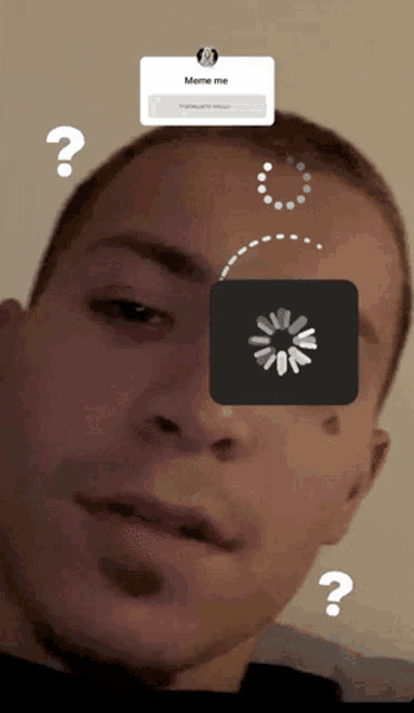 a man 's face is shown with a meme me loading screen in front of him