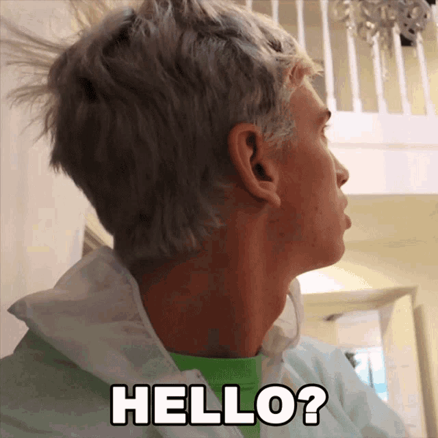 a man in a white jacket says hello in white letters