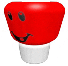 a red object with a black face on it