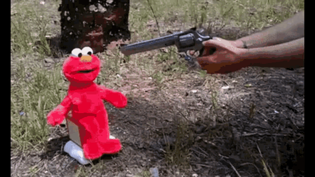 Elmo Shoot GIF - Elmo Shoot Rickroll GIFs