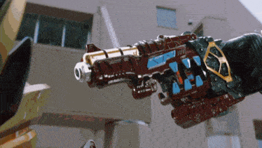 a robotic arm with a gun that says ' a / a ' on it