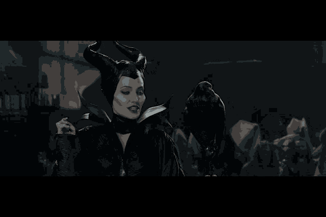 a woman with horns and a crow on her arm