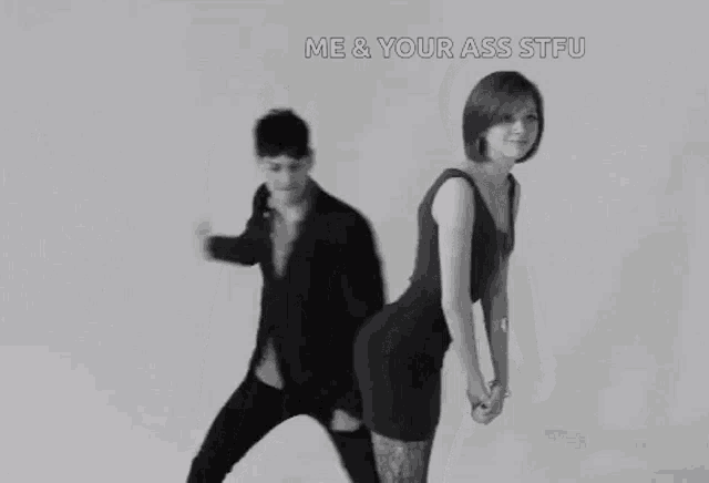 a black and white photo of a man and a woman dancing together .