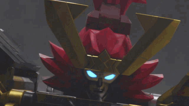 a robot has a red sword with chinese writing on the blade