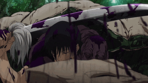 a person with a sword in their hand laying on a rock
