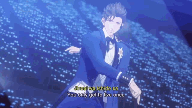 a man in a tuxedo is dancing on a stage in front of a crowd of people .