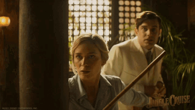 a man and a woman in a jungle cruise movie