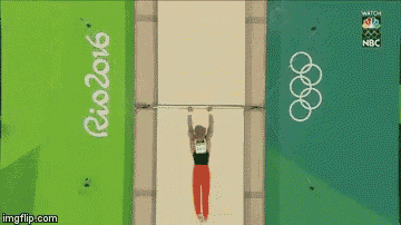 an aerial view of a gymnast performing a trick at the rio 2016 olympics .