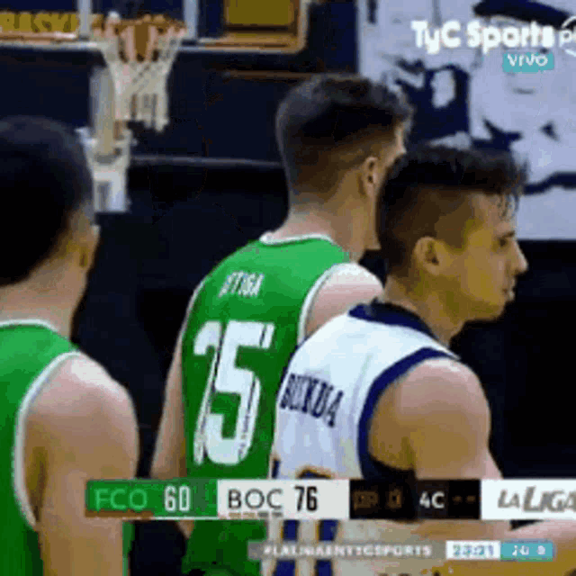 a basketball player wearing a green jersey with the number 25 on it