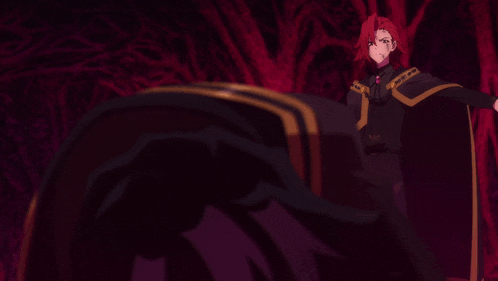 a man in a black cape with gold stripes stands in a dark room
