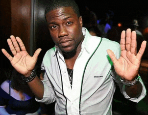 a man in a white shirt with the word dsquared on the front